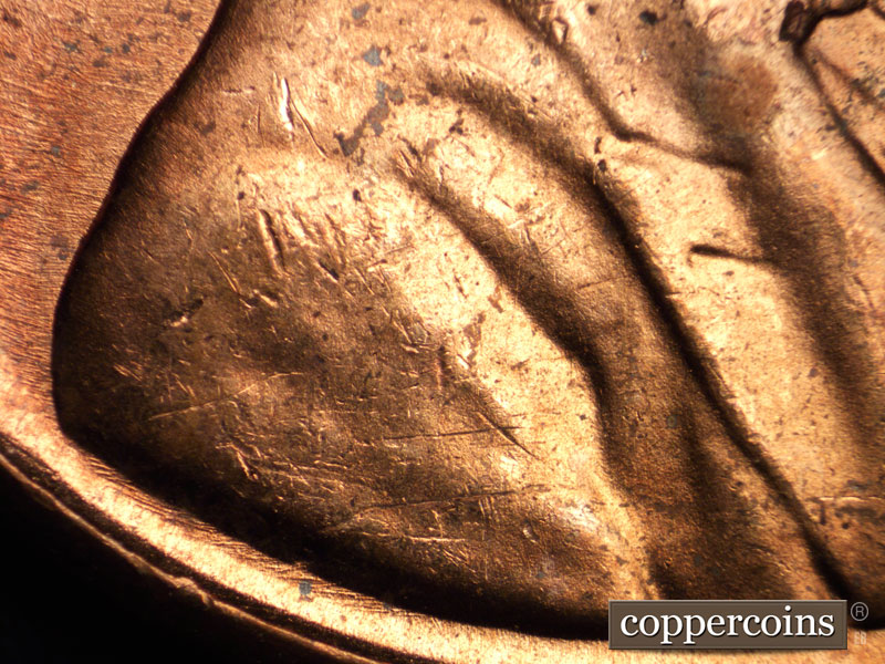 Die-stage B marker on 1964P•1DO•005 (1964 Doubled Die Obverse).