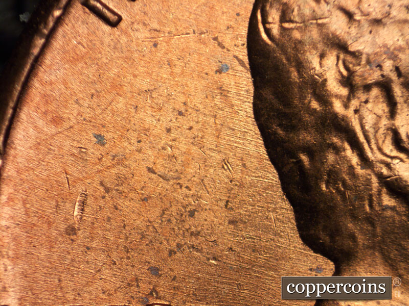 Die-stage B marker on 1964P•1DO•005 (1964 Doubled Die Obverse).