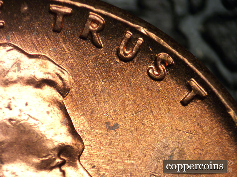 Die-stage B marker on 1964P•1DO•005 (1964 Doubled Die Obverse).