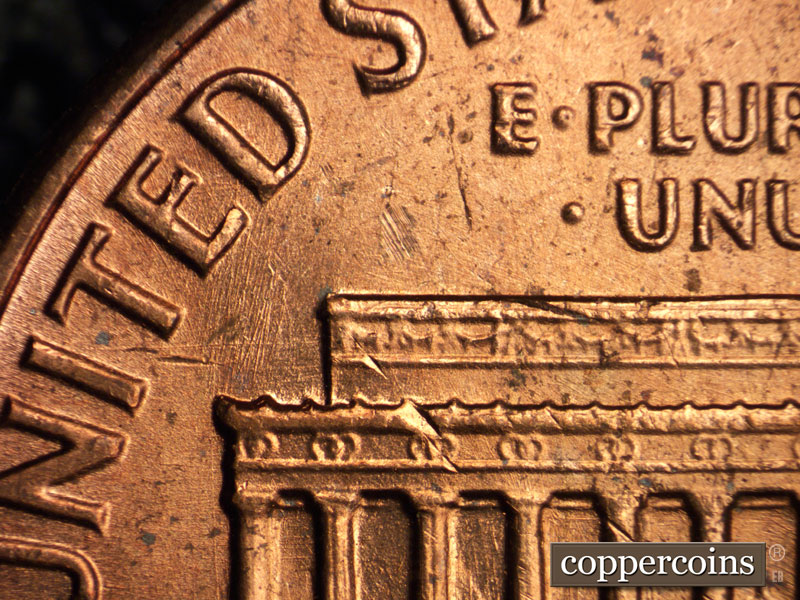 Die-stage B marker on 1964P•1DO•005 (1964 Doubled Die Obverse).