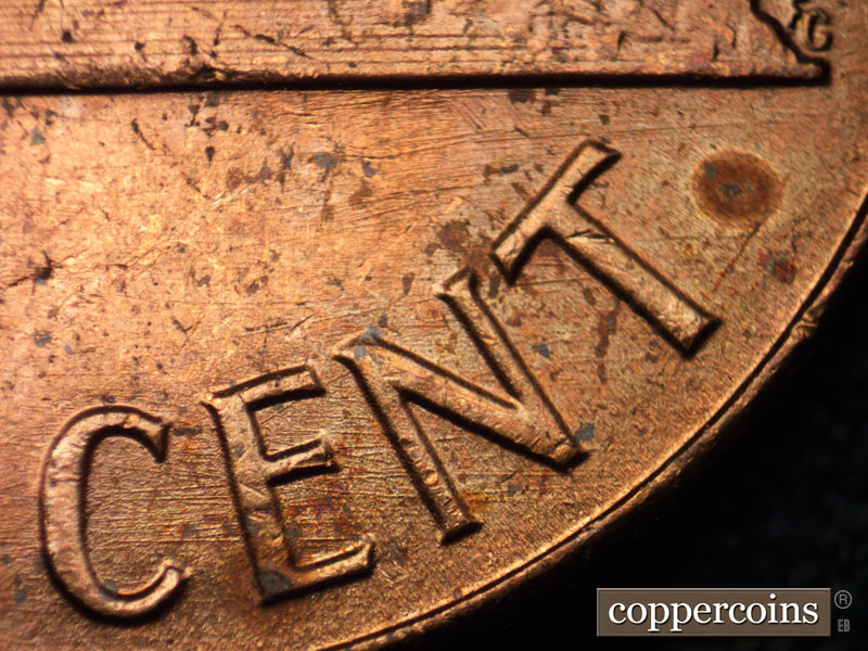 Die-stage B marker on 1964P•1DO•005 (1964 Doubled Die Obverse).