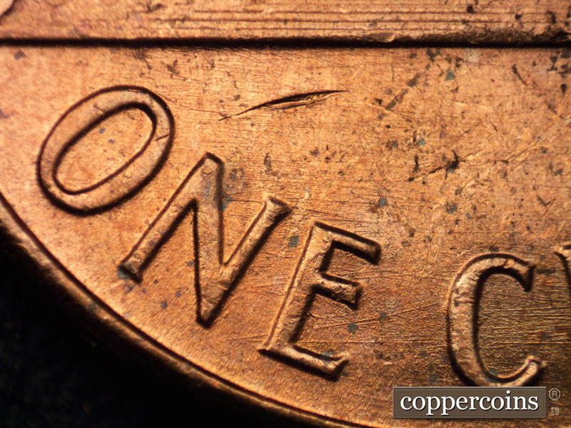 Die-stage B marker on 1964P•1DO•005 (1964 Doubled Die Obverse).
