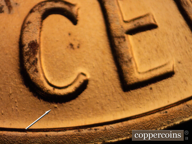 Die-stage B marker on 1964P•1DO•009P (1964 Doubled Die Obverse).
