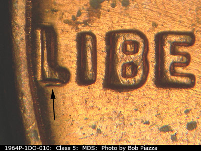 Die-stage B marker on 1964P•1DO•010 (1964 Doubled Die Obverse).