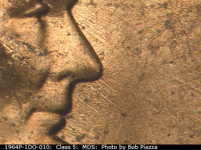 Die-stage B marker on 1964P•1DO•010 (1964 Doubled Die Obverse).
