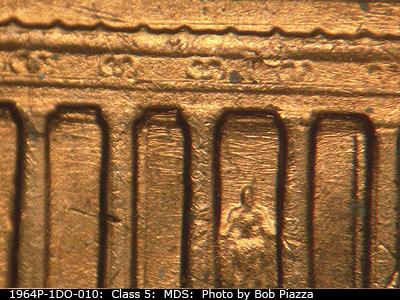 Die-stage B marker on 1964P•1DO•010 (1964 Doubled Die Obverse).