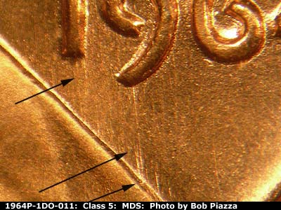 Die-stage B marker on 1964P•1DO•011 (1964 Doubled Die Obverse).