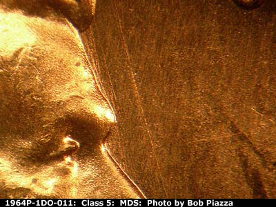 Die-stage B marker on 1964P•1DO•011 (1964 Doubled Die Obverse).
