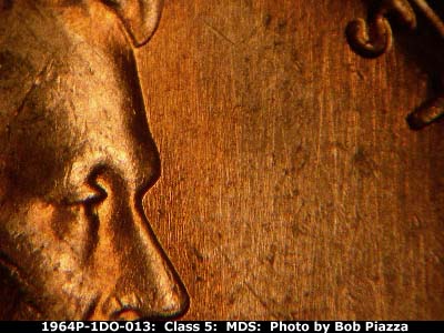 Die-stage B marker on 1964P•1DO•013 (1964 Doubled Die Obverse).