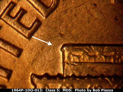 Die-stage B marker on 1964P•1DO•013 (1964 Doubled Die Obverse).