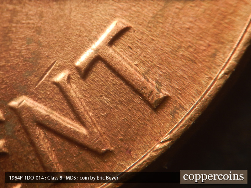Die-stage B marker on 1964P•1DO•014 (1964 Doubled Die Obverse).