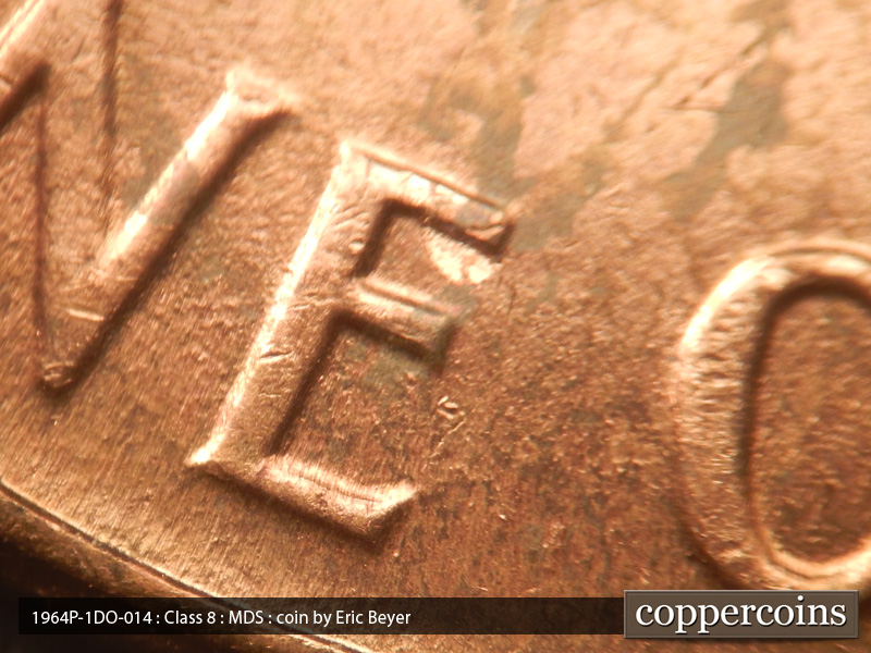 Die-stage B marker on 1964P•1DO•014 (1964 Doubled Die Obverse).