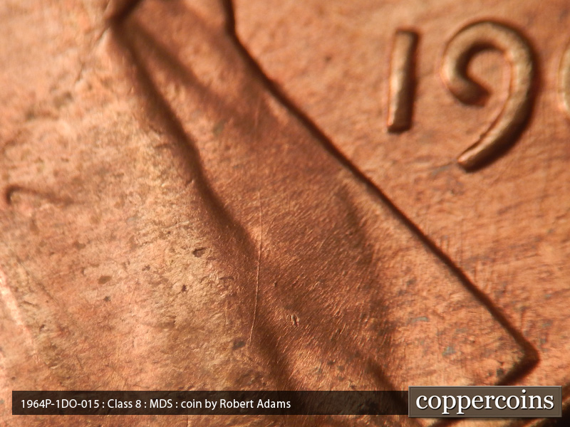 Die-stage B marker on 1964P•1DO•015 (1964 Doubled Die Obverse).