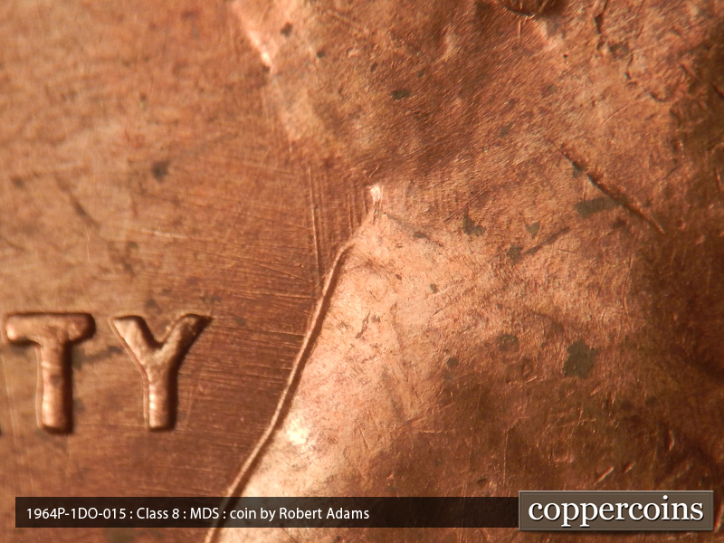 Die-stage B marker on 1964P•1DO•015 (1964 Doubled Die Obverse).
