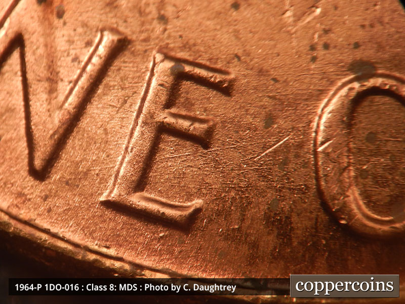 Die-stage B marker on 1964P•1DO•016 (1964 Doubled Die Obverse).