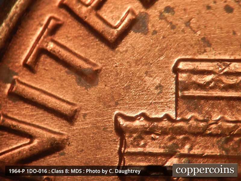 Die-stage B marker on 1964P•1DO•016 (1964 Doubled Die Obverse).