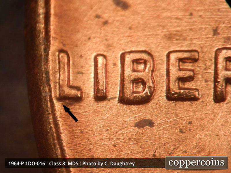 Die-stage B marker on 1964P•1DO•016 (1964 Doubled Die Obverse).
