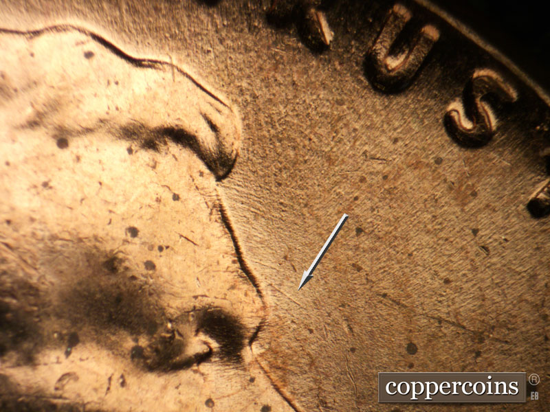 Die-stage C marker on 1964P•1DO•017 (1964 Doubled Die Obverse).