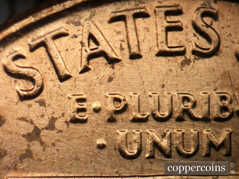 Die-stage C marker on 1964P•1DO•017 (1964 Doubled Die Obverse).