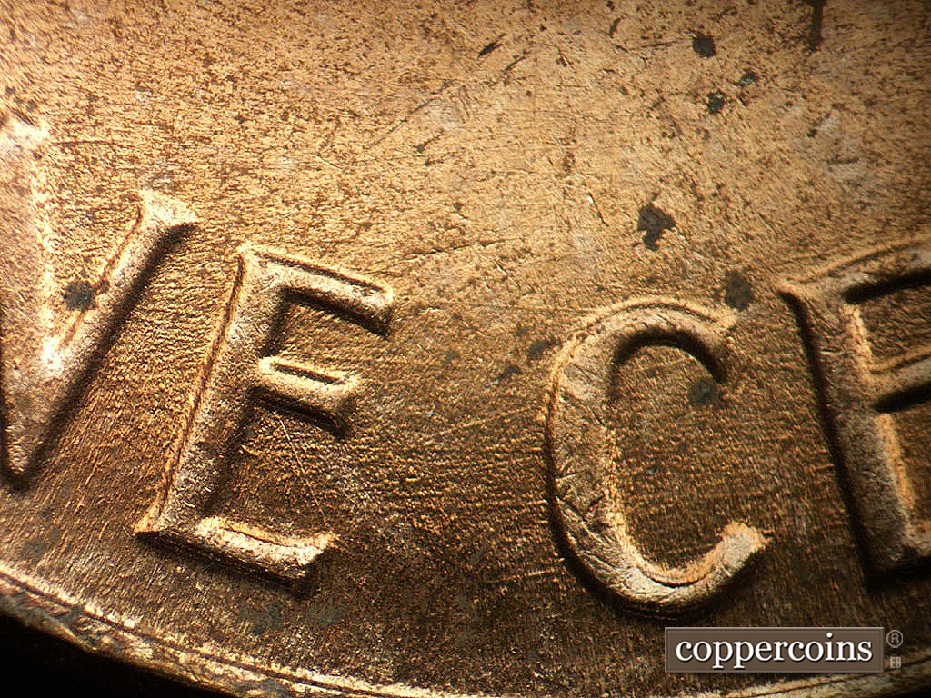 Die-stage B marker on 1964P•1DO•019 showing Die scratches through ONE CENT.