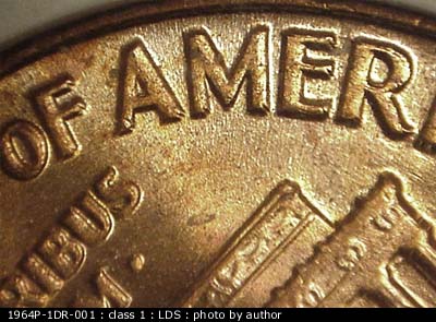 Die-stage C marker on 1964P•1DR•001 (1964 Doubled Die Reverse).