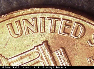 Die-stage C marker on 1964P•1DR•001 (1964 Doubled Die Reverse).