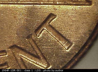 Die-stage C marker on 1964P•1DR•001 (1964 Doubled Die Reverse).