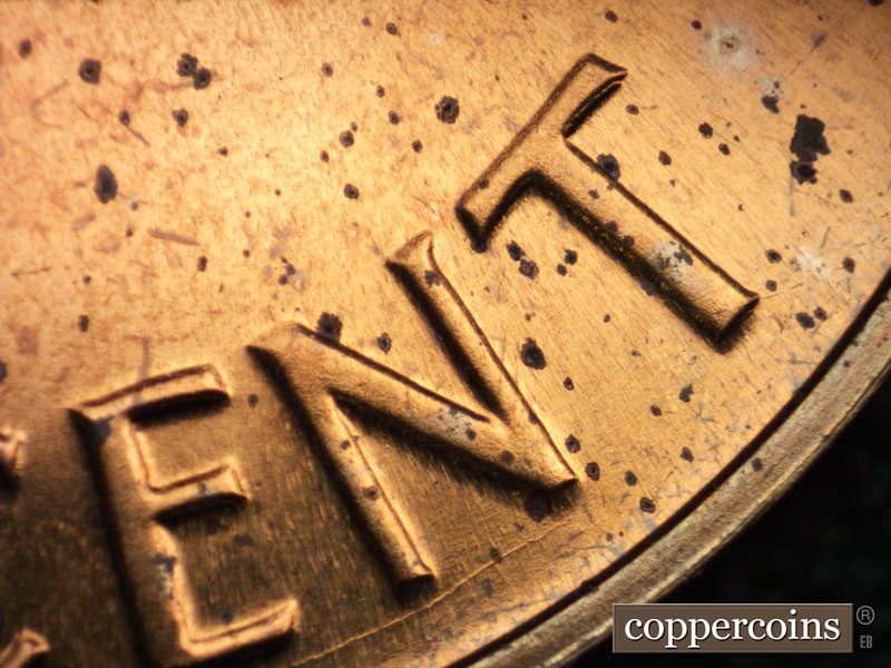 Die-stage B marker on 1964P•1DR•002P (1964 Doubled Die Reverse).