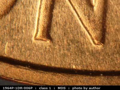 Die-stage B marker on 1964P•1DR•006P (1964 Doubled Die Reverse).