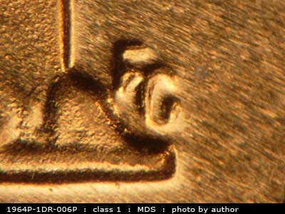 Die-stage B marker on 1964P•1DR•006P (1964 Doubled Die Reverse).