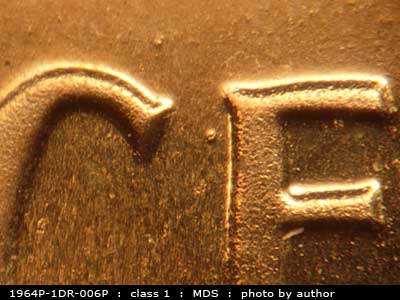 Die-stage B marker on 1964P•1DR•006P (1964 Doubled Die Reverse).