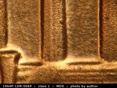 Die-stage B marker on 1964P•1DR•006P (1964 Doubled Die Reverse).
