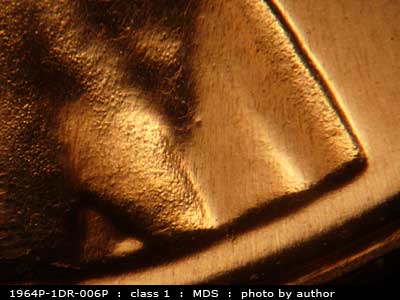 Die-stage B marker on 1964P•1DR•006P (1964 Doubled Die Reverse).