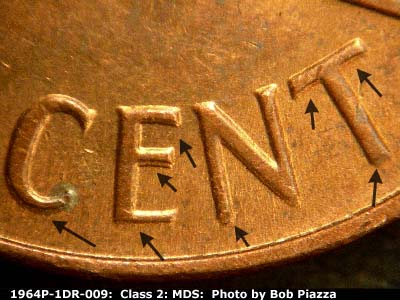 Die-stage B marker on 1964P•1DR•009 (1964 Doubled Die Reverse).