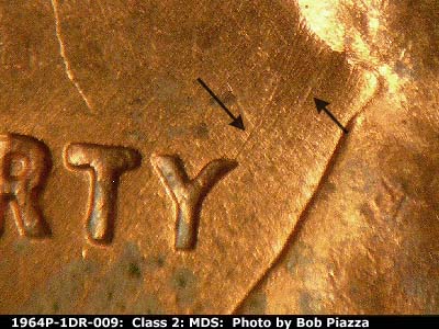 Die-stage B marker on 1964P•1DR•009 (1964 Doubled Die Reverse).