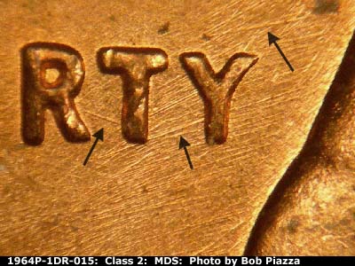Die-stage B marker on 1964P•1DR•015 (1964 Doubled Die Reverse).