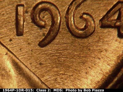 Die-stage B marker on 1964P•1DR•015 (1964 Doubled Die Reverse).