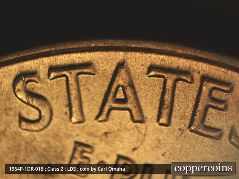 Die-stage C marker on 1964P•1DR•015 (1964 Doubled Die Reverse).