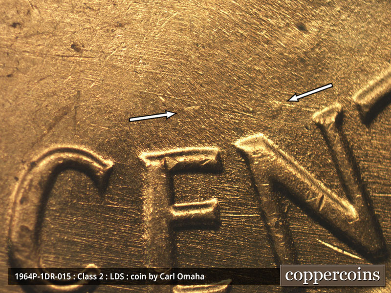 Die-stage C marker on 1964P•1DR•015 (1964 Doubled Die Reverse).