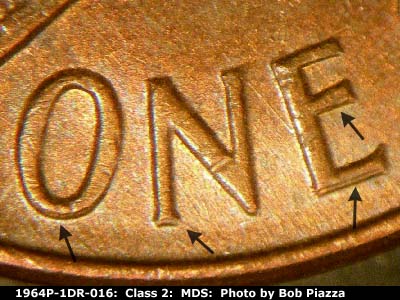 Die-stage B marker on 1964P•1DR•016 (1964 Doubled Die Reverse).