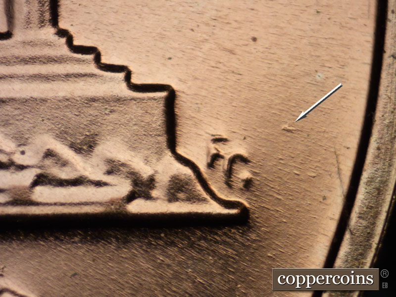 Die-stage B marker on 1964P•1DR•017P (1964 Doubled Die Reverse).