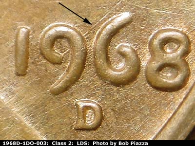 Die-stage C marker on 1968D•1DO•003 (1968 Doubled Die Obverse).