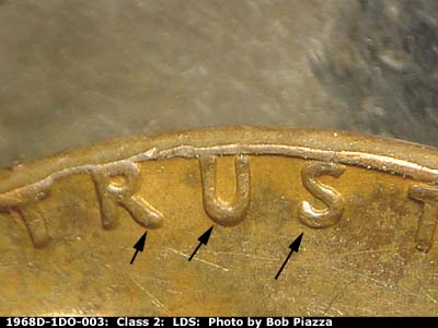 Die-stage C marker on 1968D•1DO•003 (1968 Doubled Die Obverse).