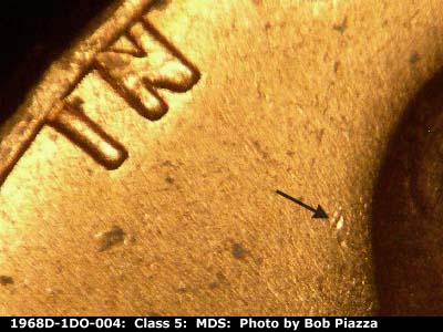 Die-stage B marker on 1968D•1DO•004 (1968 Doubled Die Obverse).