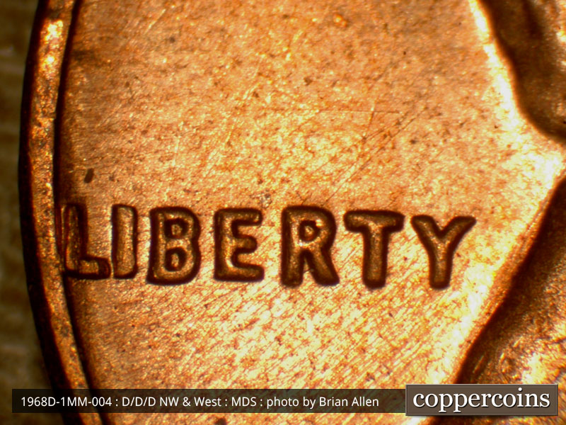 Die-stage B marker on 1968D•1MM•004 (1968 Repunched Mint Mark).