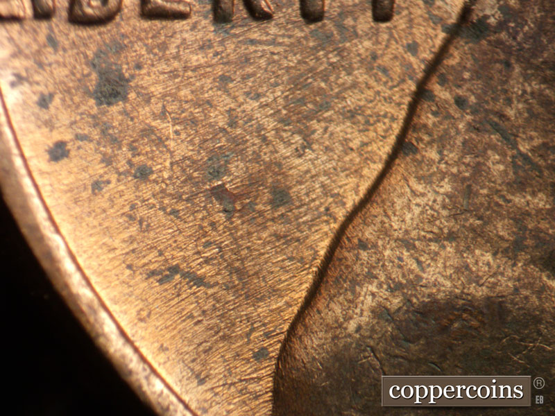 Die-stage B marker on 1968D•1MM•007 (1968 Repunched Mint Mark).