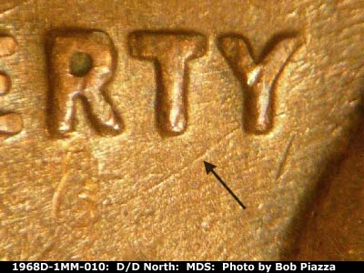 Die-stage B marker on 1968D•1MM•010 (1968 Repunched Mint Mark).