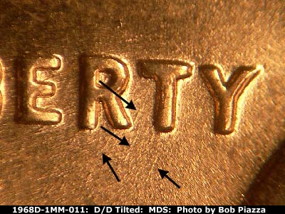 Die-stage B marker on 1968D•1MM•011 (1968 Repunched Mint Mark).