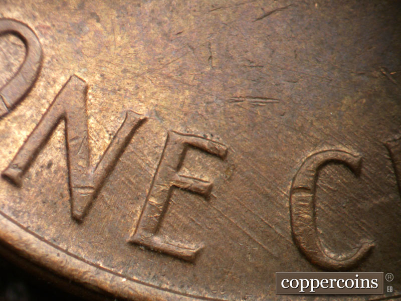 Die-stage B marker on 1968D•1MM•012 (1968 Repunched Mint Mark).
