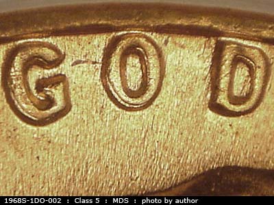 Die-stage B marker on 1968S•1DO•002 (1968 Doubled Die Obverse).
